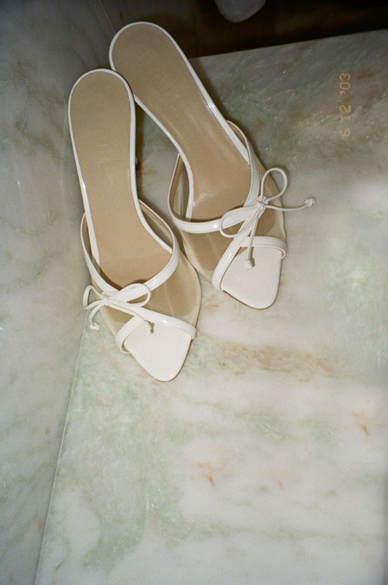 pony white heeled bow sandal
