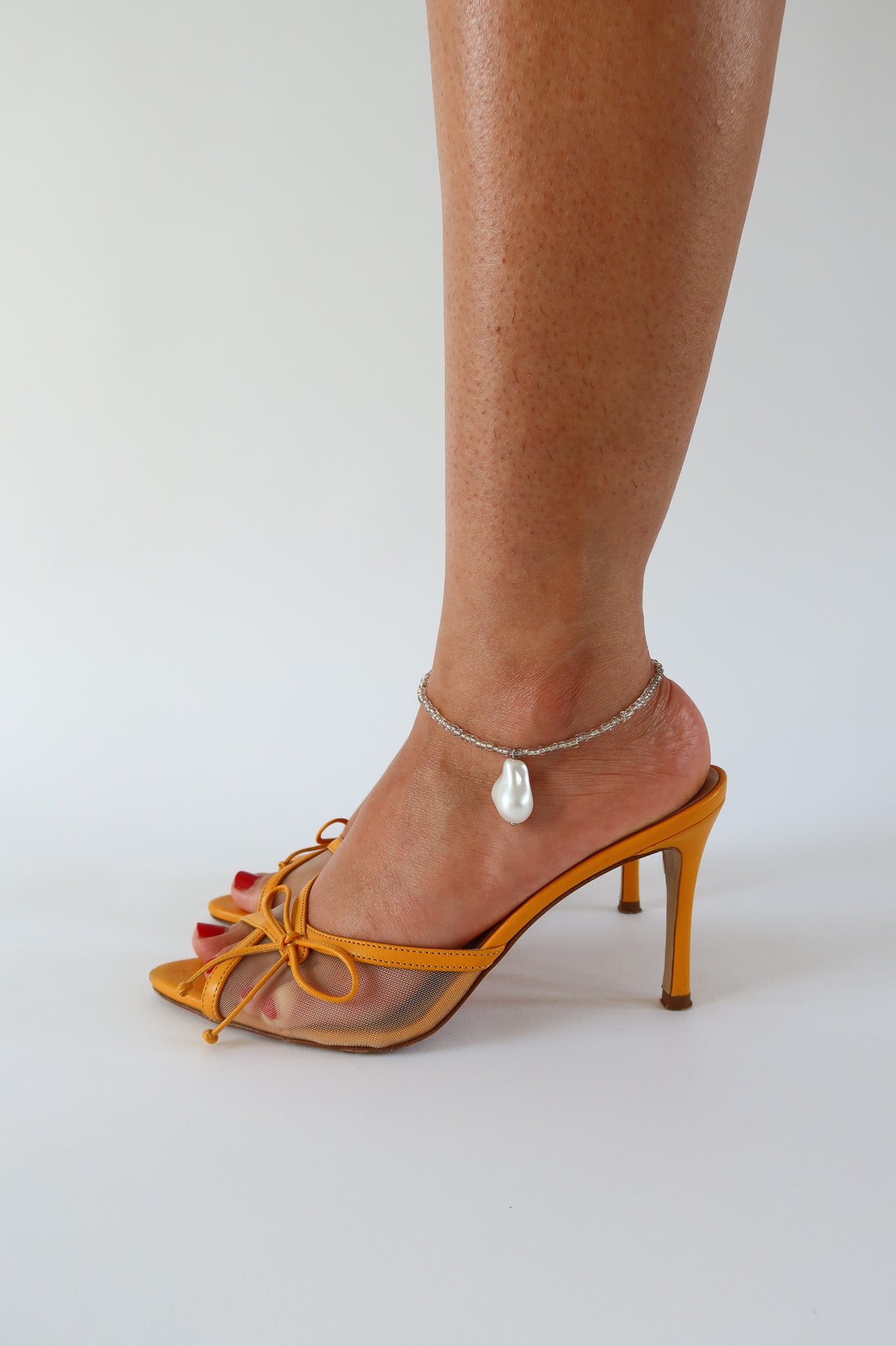 pony orange heeled bow sandal