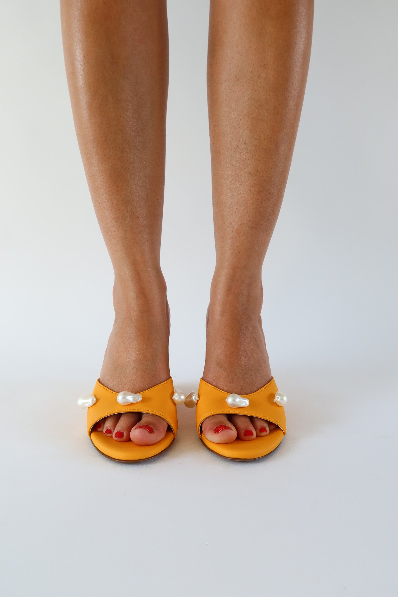 kourtney mango orange wedge
