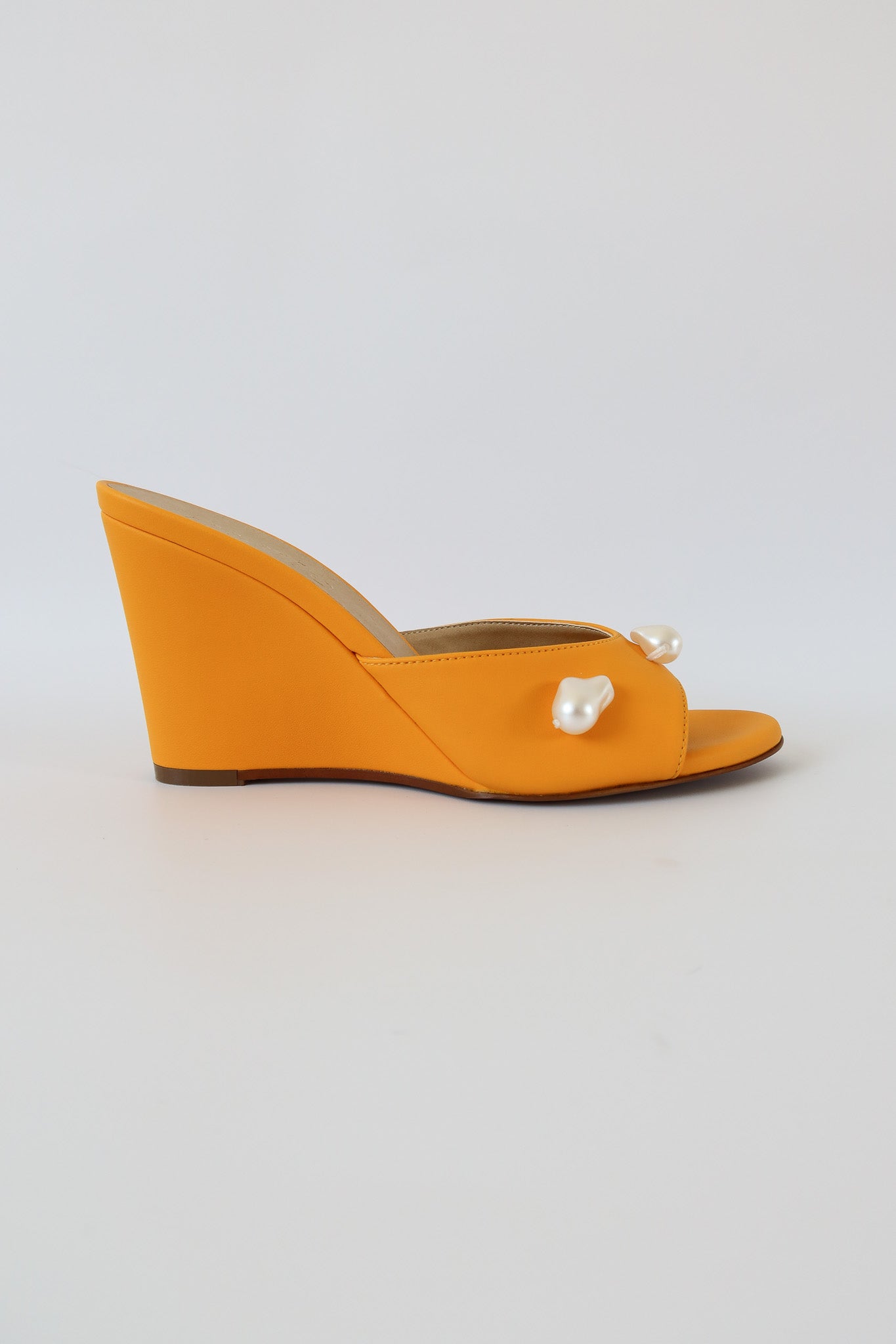 kourtney mango orange wedge