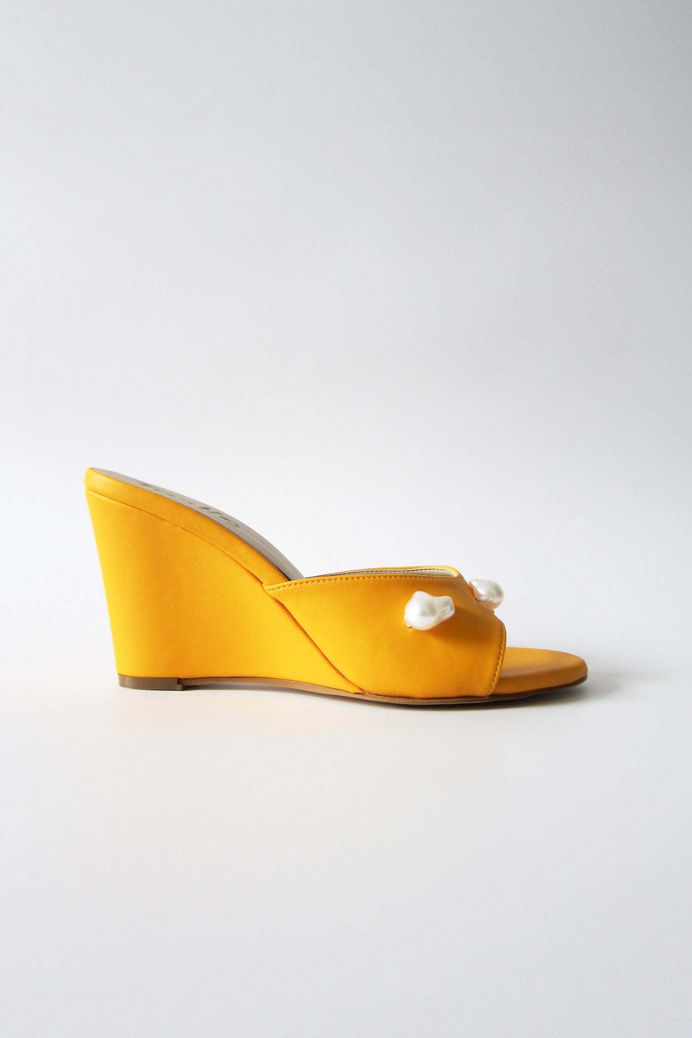 kourtney mango orange wedge
