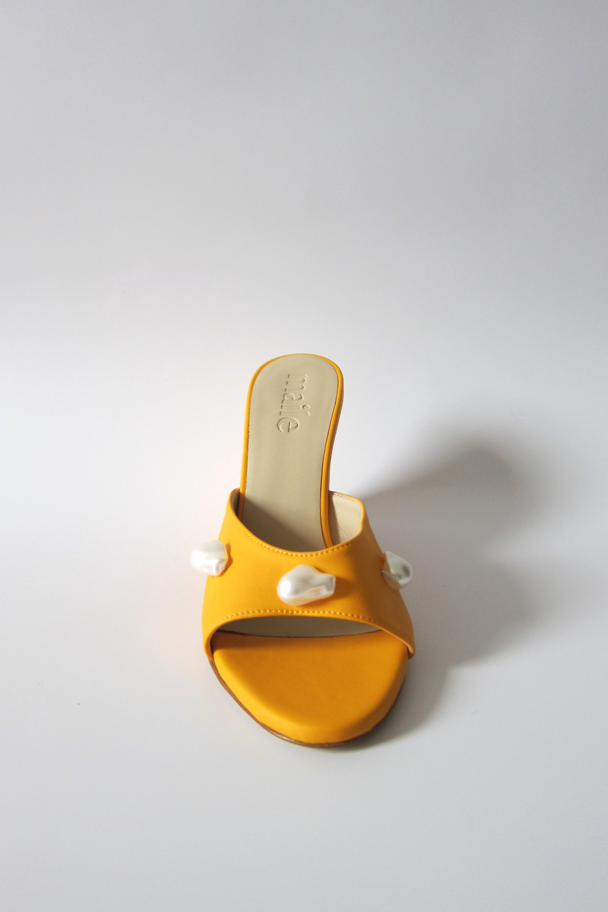 kourtney mango orange wedge